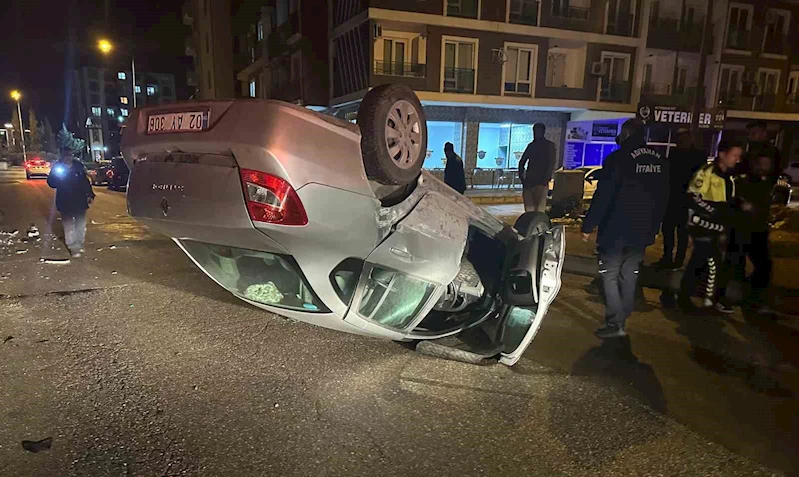 İki otomobilin çarpışması sonucu araçlardan biri ters döndü
