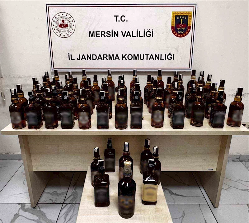 Otomobilden şişe şişe kaçak içki çıktı
